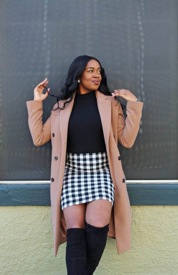 pexels-photo-3597932 woman in black and white checked mini skirt and brown coat