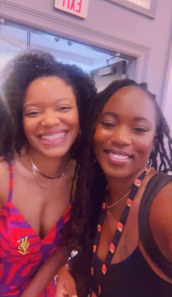 black women smiling and happy