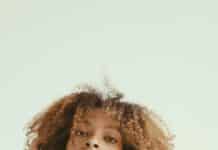 The Luxury of a Smaller Life: What Happens When You Stop Performing black woman with type 4 hair